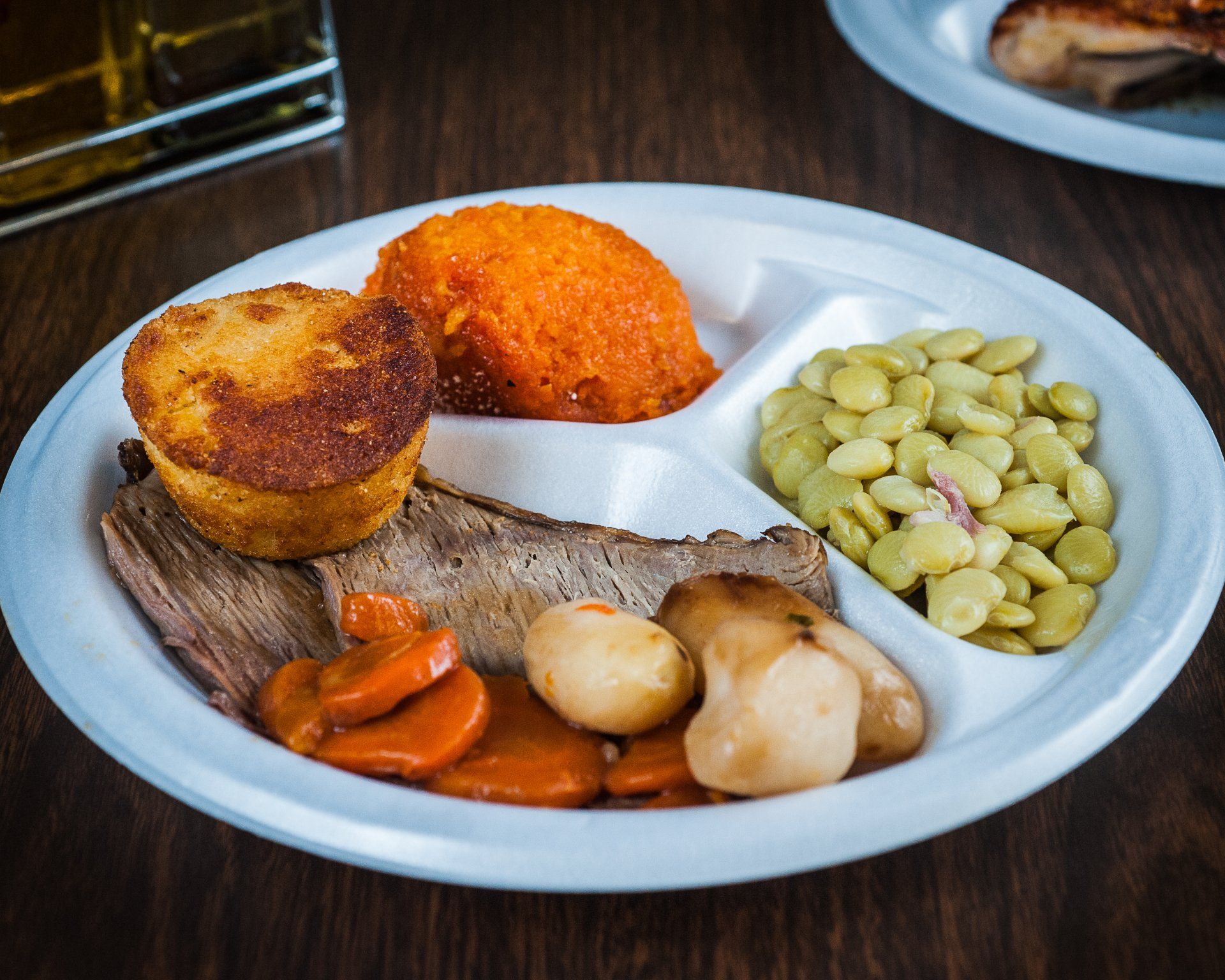 Slow-cooked pot roast plate with potatoes and carrots